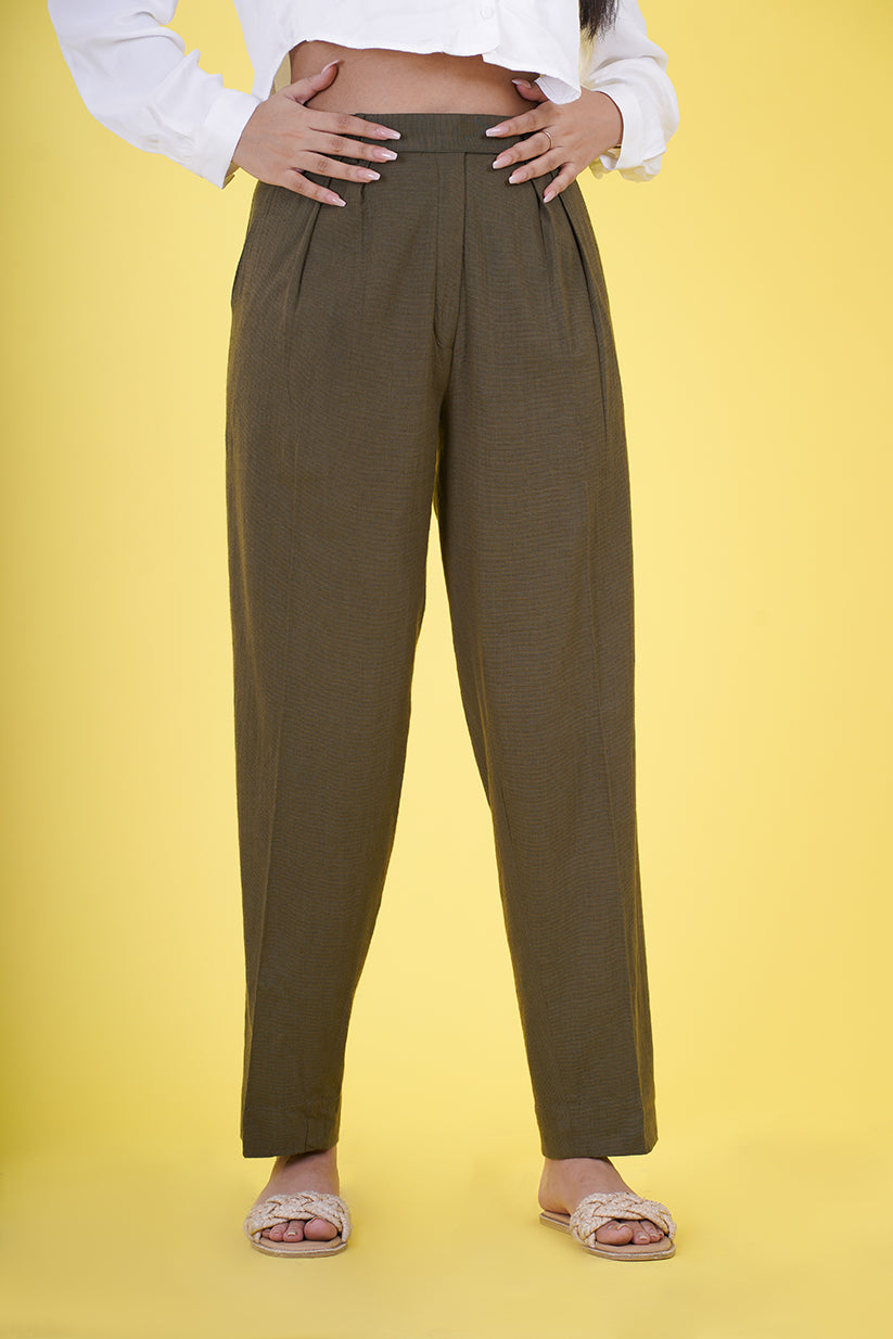 High Rise Pleated Parallel Trousers - These trousers feature a flattering high-waist design with elegant pleats, offering a classic yet versatile look. Crafted with attention to detail and comfort in mind, they provide a tailored fit suitable for various events. Ideal for the office or upscale outings, our High Rise Pleated Parallel Trousers are a wardrobe essential.