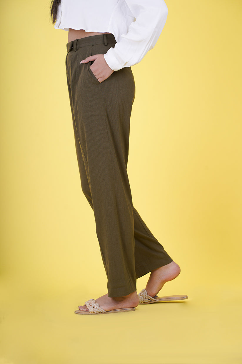 High Rise Pleated Parallel Trousers - These trousers feature a flattering high-waist design with elegant pleats, offering a classic yet versatile look. Crafted with attention to detail and comfort in mind, they provide a tailored fit suitable for various events. Ideal for the office or upscale outings, our High Rise Pleated Parallel Trousers are a wardrobe essential.