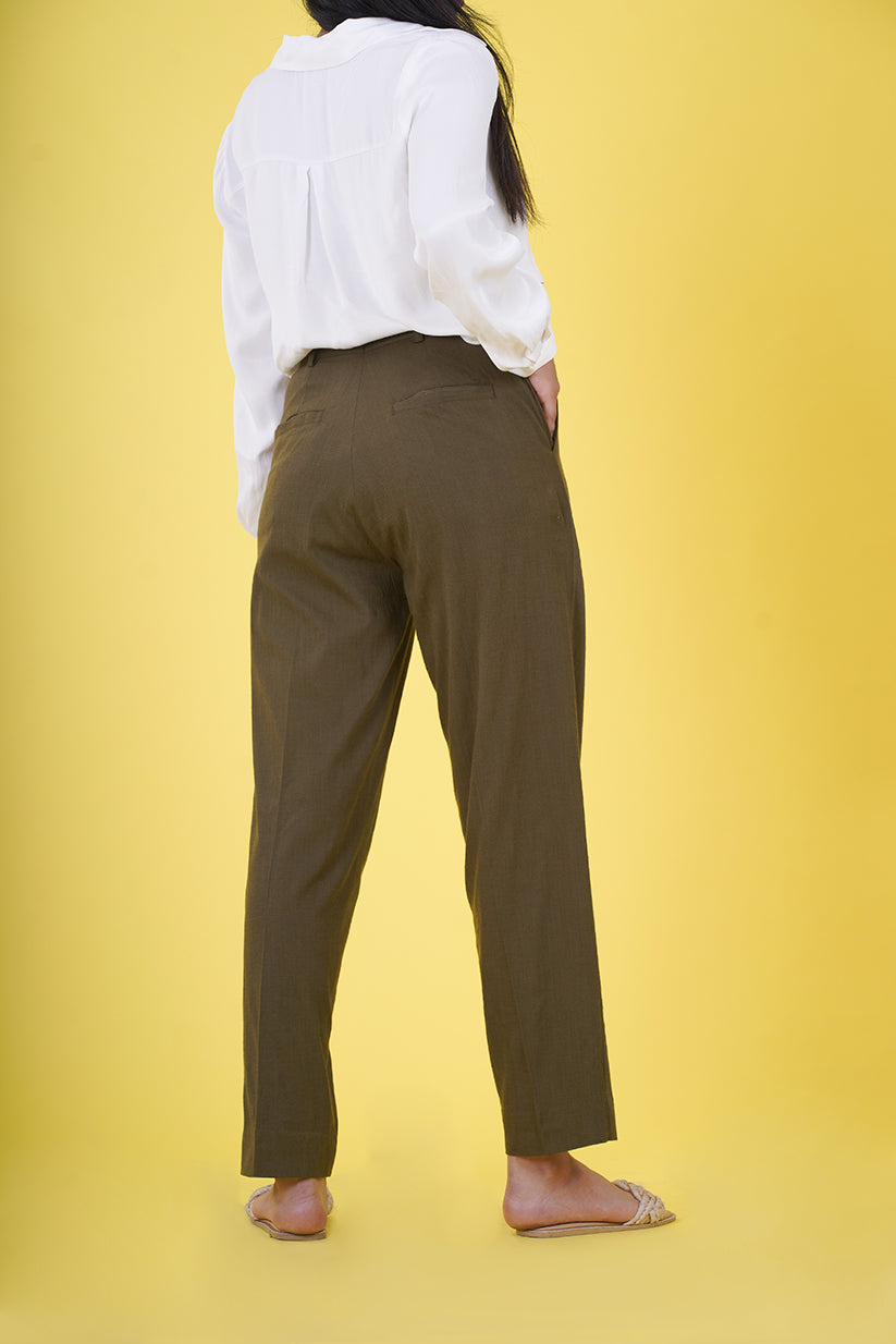 High Rise Pleated Parallel Trousers - These trousers feature a flattering high-waist design with elegant pleats, offering a classic yet versatile look. Crafted with attention to detail and comfort in mind, they provide a tailored fit suitable for various events. Ideal for the office or upscale outings, our High Rise Pleated Parallel Trousers are a wardrobe essential.