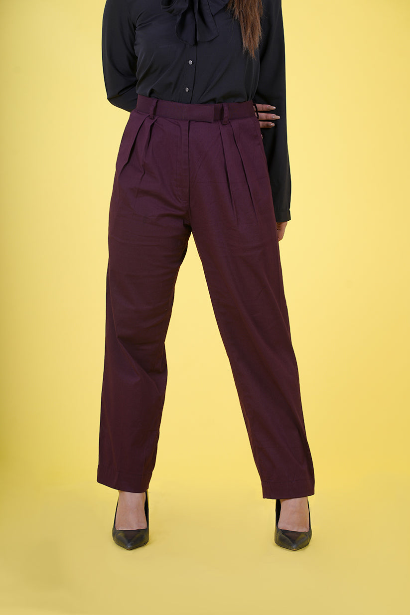 High Rise Pleated Parallel Trousers - These trousers feature a flattering high-waist design with elegant pleats, offering a classic yet versatile look. Crafted with attention to detail and comfort in mind, they provide a tailored fit suitable for various events. Ideal for the office or upscale outings, our High Rise Pleated Parallel Trousers are a wardrobe essential.