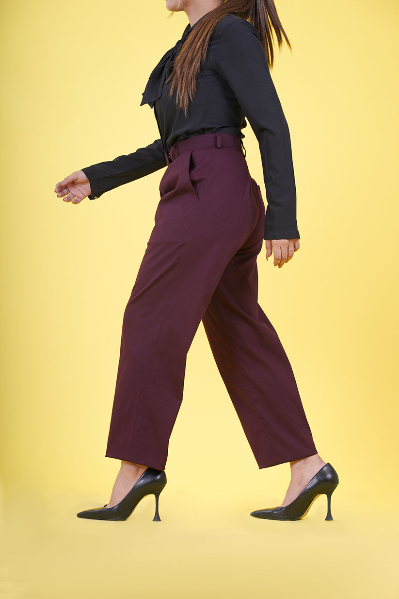 High Rise Pleated Parallel Trousers - These trousers feature a flattering high-waist design with elegant pleats, offering a classic yet versatile look. Crafted with attention to detail and comfort in mind, they provide a tailored fit suitable for various events. Ideal for the office or upscale outings, our High Rise Pleated Parallel Trousers are a wardrobe essential.