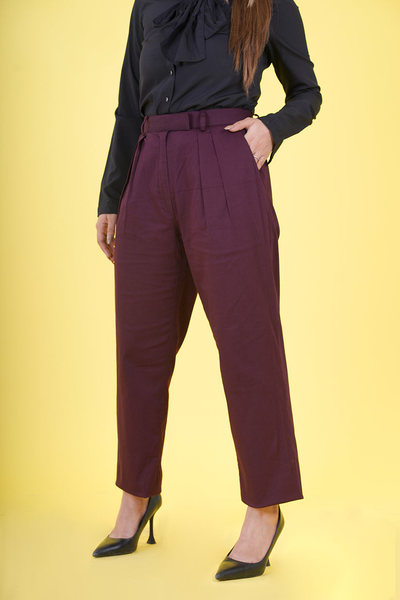 High Rise Pleated Parallel Trousers - These trousers feature a flattering high-waist design with elegant pleats, offering a classic yet versatile look. Crafted with attention to detail and comfort in mind, they provide a tailored fit suitable for various events. Ideal for the office or upscale outings, our High Rise Pleated Parallel Trousers are a wardrobe essential.