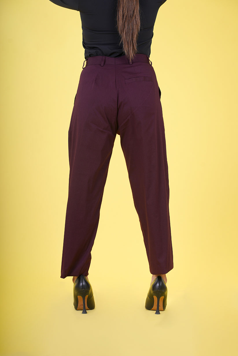 High Rise Pleated Parallel Trousers - These trousers feature a flattering high-waist design with elegant pleats, offering a classic yet versatile look. Crafted with attention to detail and comfort in mind, they provide a tailored fit suitable for various events. Ideal for the office or upscale outings, our High Rise Pleated Parallel Trousers are a wardrobe essential.